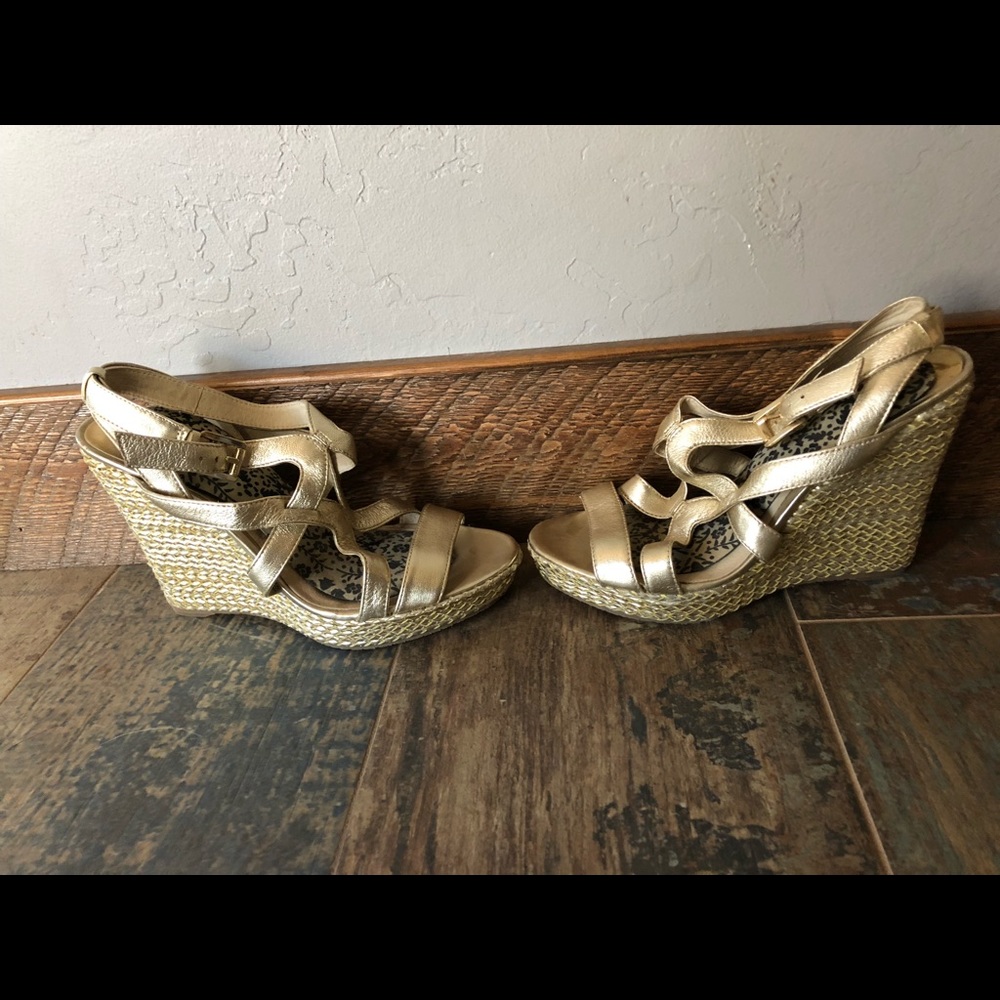 Brand new Michael Kors gold wedges